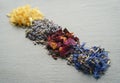 Floral herbs - dried marigold, lavender, rose and cornflower petals as ingredients for cooking Royalty Free Stock Photo