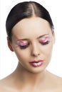 The floral makeup, she is turned of three quarters