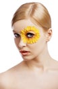 The floral makeup, she is turned of three quarters