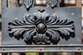 Floral ornament on the wrought cast iron fence Royalty Free Stock Photo