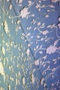 Floral ornaments on blue wall and ceiling of an old building interior Royalty Free Stock Photo