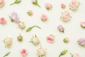 Floral pattern assorted roses ivory background