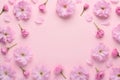 Floral pattern of blooming sakura flowers with buds and petals on pink pastel background Royalty Free Stock Photo