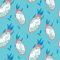 Floral pattern with dragon fruit on a blue background in pink and magenta colors.