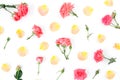 Floral pattern made of roses flowers and petals on white background. Flat lay, top view Royalty Free Stock Photo