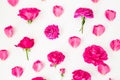 Floral pattern with pink rose flowers and petals on white background. Flat lay, Top view. Flowers texture. Royalty Free Stock Photo