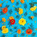 Floral pattern of yellow and red flowers on blue background. Flat lay, top view. Floral background. Royalty Free Stock Photo