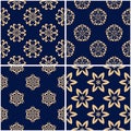 Floral patterns. Set of golden blue seamless backgrounds Royalty Free Stock Photo