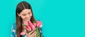 floral present. happy child with tulips. mothers or womens day. Banner of spring child girl with tulips flowers bouquet Royalty Free Stock Photo