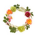 Floral round crown (wreath) with flowers and leaves. Flat lay Royalty Free Stock Photo