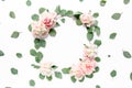 Floral round frame wreath made of pink and beige peonies flower buds, eucalyptus branches and leaves isolated on white Royalty Free Stock Photo