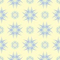 Floral seamless background. Blue and green flower pattern on beige backdrop Royalty Free Stock Photo