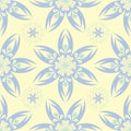 Floral seamless background. Blue and green flower pattern on beige backdrop Royalty Free Stock Photo