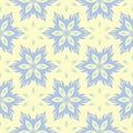 Floral seamless background. Blue and green flower pattern on beige backdrop Royalty Free Stock Photo