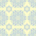 Floral seamless pattern. Beige background with light blue and green flower elements Royalty Free Stock Photo