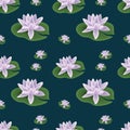 Floral seamless pattern with lotuses on trendy navy background.Cute ornament with incredibly beautiful water flowers.For fabrics, Royalty Free Stock Photo