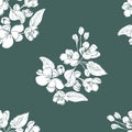 Floral seamless pattern of white blossoming brunch of apple tree flowers on dark green background. Hand drawn sketch. Royalty Free Stock Photo