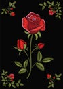 Floral stitched ornament with stitch rose. Embroidery flower on a dark flap cloth background. Ornamental needlework.