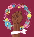 Floral Symbol of Feminism Movement. African American Woman Hand with her fist raised up. Wreaht of Flowers. Girl Power Sign on Royalty Free Stock Photo