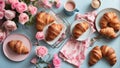 Floral table setting with French croissants.
