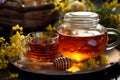 Floral tea in cup, honey jar, teapot surrounded by herbs relaxing nature ensemble