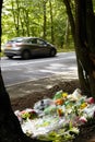 Floral Tributes At Scene Of Fatal Accident On Busy Road With Speeding Car Royalty Free Stock Photo