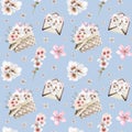 Floral watercolor seamless pattern with pink white almond flowers in baskets and envelopes on light blue background