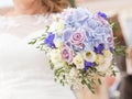 A floral wedding bouquet in a weddind day