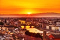 Florence Aerial View at Golden Sunset over Ponte Vecchio Bridge