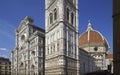 Florence cathedral facade detail and Brunelleschi`s dome Royalty Free Stock Photo