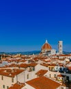 Florence Cathedral and Giotto`s Bell Tower under blue sky, over houses of the historical center of Florence, Italy Royalty Free Stock Photo