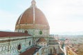 Florence city aerial view with duomo dome and cityscape on horizon