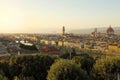 Florence city during golden sunset. Panoramic view of the river Arno with Ponte Vecchio bridge, Palazzo Vecchio palace and Royalty Free Stock Photo