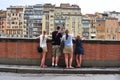 Florence city with tourists enjoying view on the Arno river in Italy Royalty Free Stock Photo