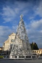 Florence, December 2018: Christmas tree in Piazza Santa Maria Novella at Florence. Christmas tree with the Basilica Royalty Free Stock Photo