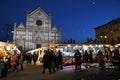 Florence, December 2019: The famous Christmas Market in Piazza Santa Croce with the Basilica on the background. Florence