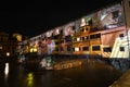 Florence - December 2020: The Famous Old Bridge Ponte Vecchio over Arno river, illuminated on the occasion of Firenze Light