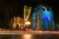 Florence, December 2020: light trails of traffic on the avenues near Freedom Square in the center of Florence with the illuminated