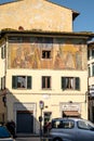Florence, Italy - 22 April, 2018: house with fresco on piazza della Calza Royalty Free Stock Photo