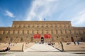 Florence, Italy - April 6, 2018: Pitti palace and square. Tourist laying in the sun