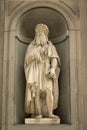 Florence, Italy - 23 April, 2018: Statue of Leonardo da Vinci on the Uffizi gallery Royalty Free Stock Photo