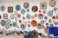 Various handmade clocks on a gift shop window in Florence, Italy