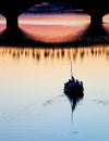 FLORENCE, ITALY, 10 AUGUST 2020: Touristic boats on Arno River near Ponte Vecchio, seen from the Ponte Santa Trinita in Florence.