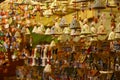 Florence, ITALY - DECEMBER 2018: small decorated bells hanging from the roof at the Christmas market