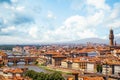 Florence, Italy. Firenze panorama cityscape with red roofs, bridges and Palazzo Vecchio in Florence