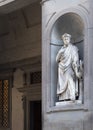 FLORENCE, ITALY, January 6, 2020: Statue of Dante Alighieri along the colonnade of the Uffizi Gallery in Florence Royalty Free Stock Photo