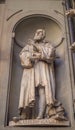 FLORENCE, ITALY - Jul 05, 2019: Statue of Galileo Galilei, on the facade of the Uffizi gallery. Florence