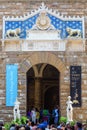 Florence, Italy - July 04, 2016: entrance of the Palazzo Vecchio in Florence with unidentified people. The palace was the seat of