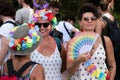 Unidentified participant with symbols of the rainbow during the Toscana Pride LGBTQ parade.