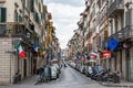 Florence, Italy - 13 July 2019: Walking Florence old town streets. View of narrow street with window shutters and old fashioned Royalty Free Stock Photo